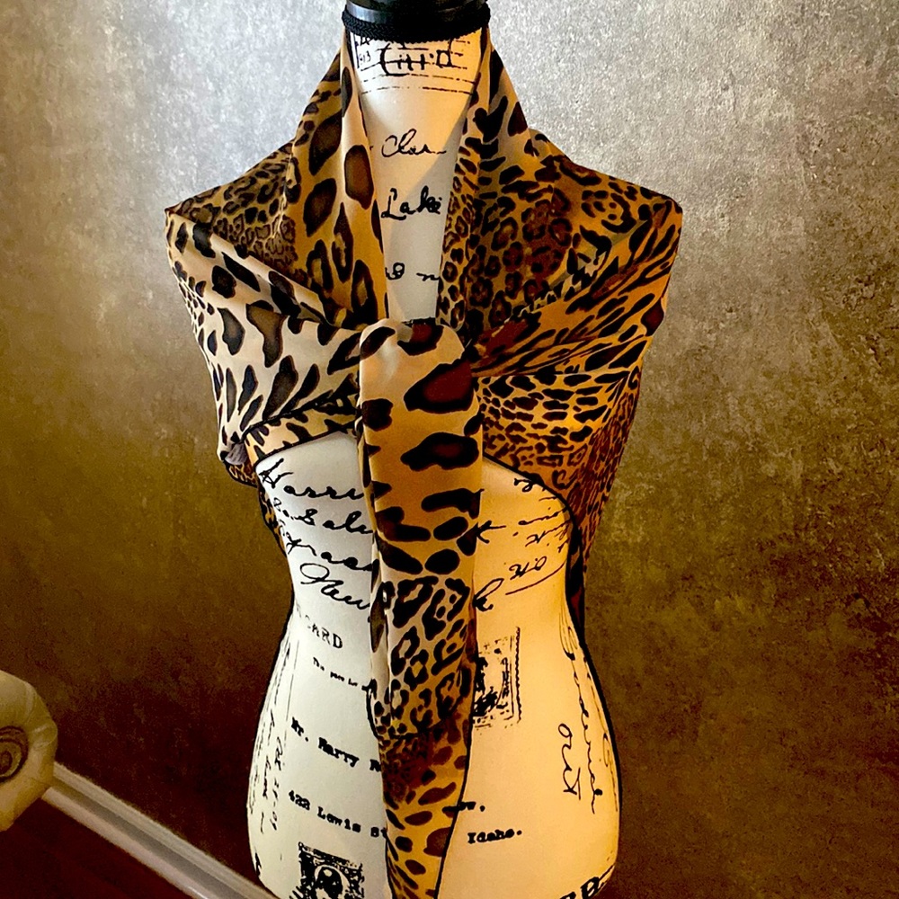 Elegant animal print accent scarf.